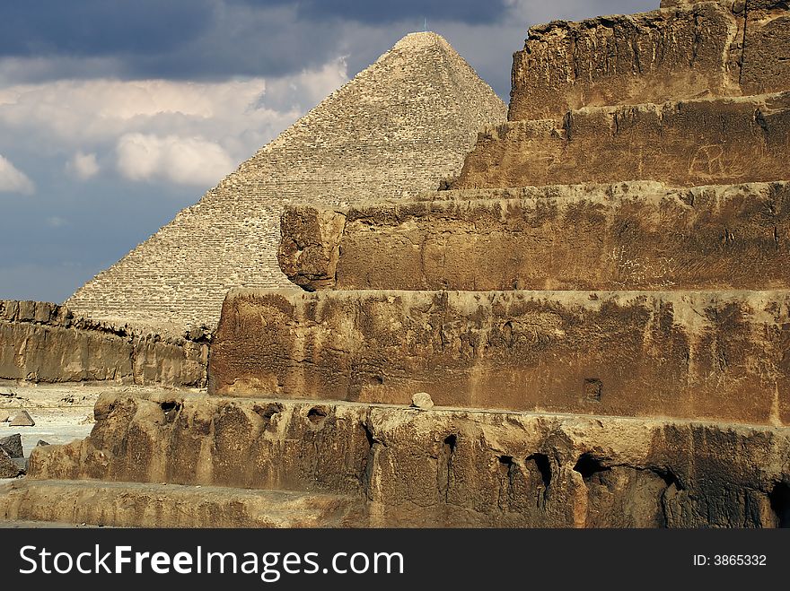 Sphinx on background of the egyptian pyramid