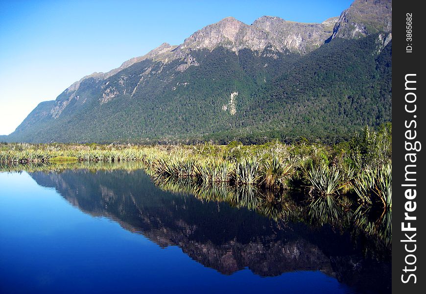 Mirror Lakes in south New Zealand by Milford Sound.