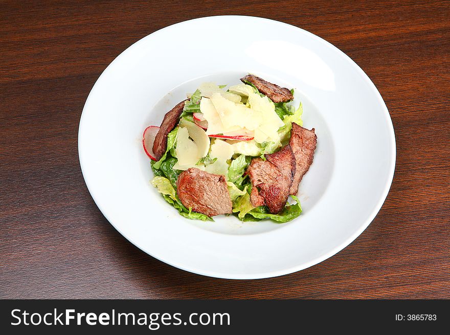 Beef salad with potato and walnut sauce