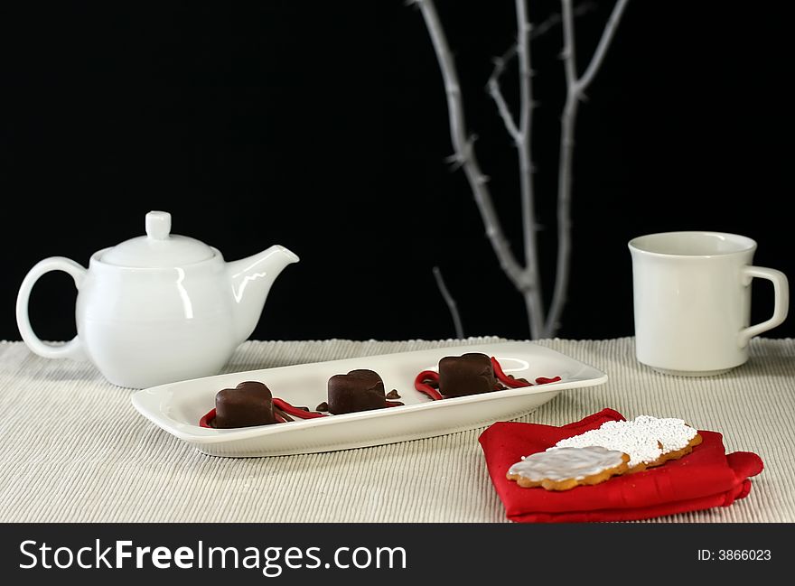 Dessert and tea with a modern table setting