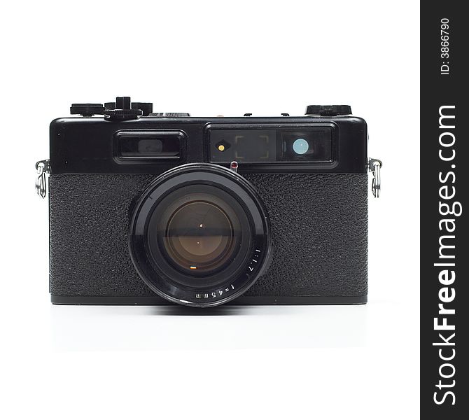 Front elevation view of old, seventies-style rangefinder camera isolated on white background. Front elevation view of old, seventies-style rangefinder camera isolated on white background