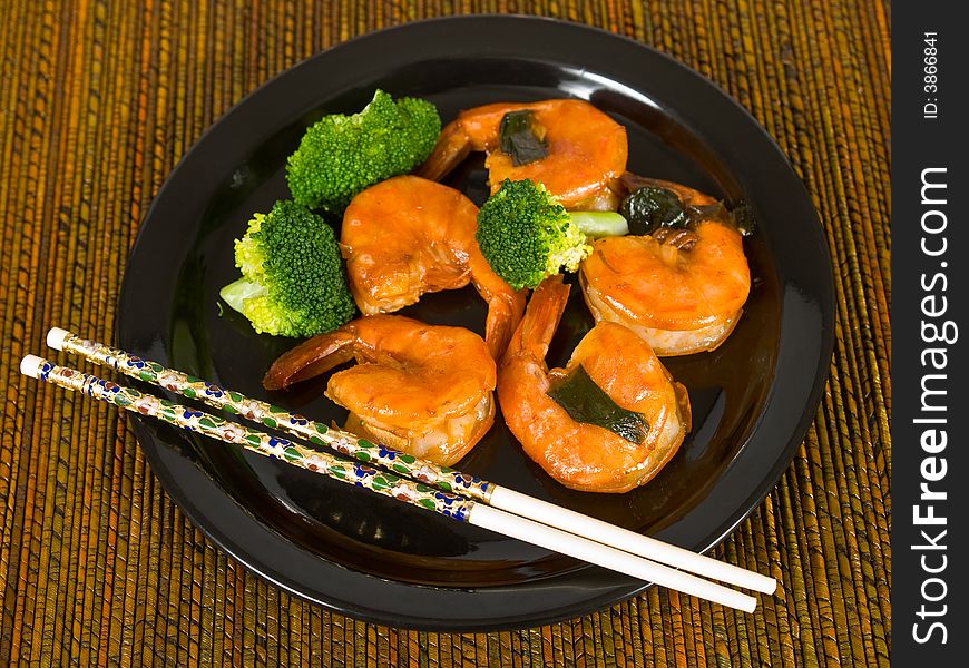 Jumbo Shrimp and Broccoli on a plate. Jumbo Shrimp and Broccoli on a plate