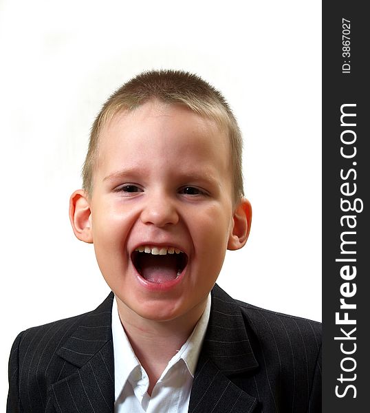 Smiling tot in gray coat and white shirt. Smiling tot in gray coat and white shirt