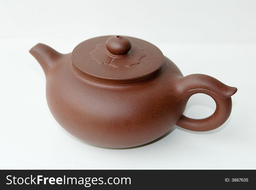 A exquisite brown zisha tea pot. A exquisite brown zisha tea pot