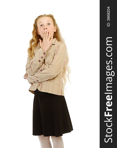 Portrait of the surprised schoolgirl on a white background