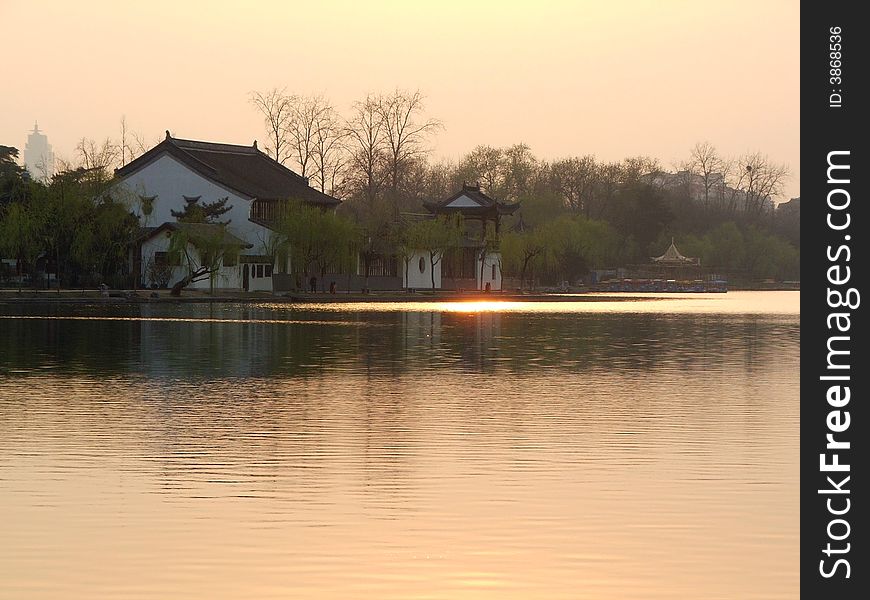 Chinese traditional Building in sunset,at No-Warry-Lake(Mochou Lake),Nanjing,Jiangsu Provice,china