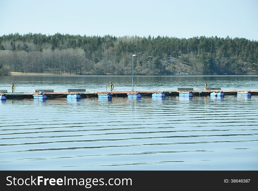 Empty jetty in early spring at Kanaan outside Stockholm, Sweden.