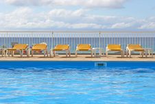 Pool Sunbeds Around A Pool Stock Photo Pool Sunbeds Around A Pool Stock Photo