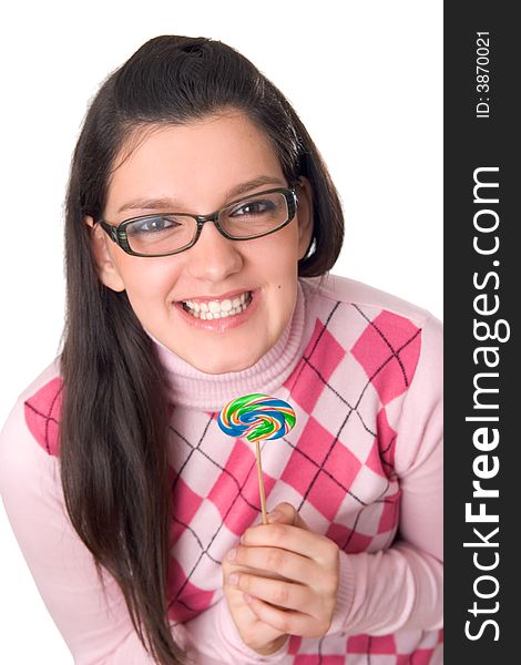 Young happy girl holding lollipop