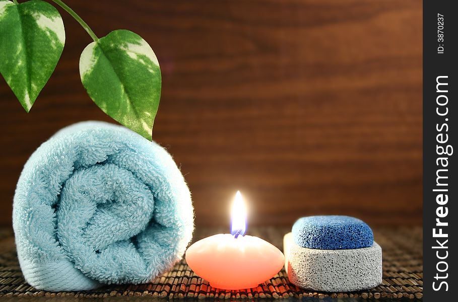Towel,candle,pumice and leaf. Towel,candle,pumice and leaf