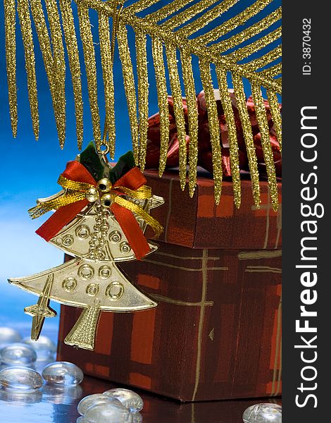 Festive decoration Christmas tree on golden branch