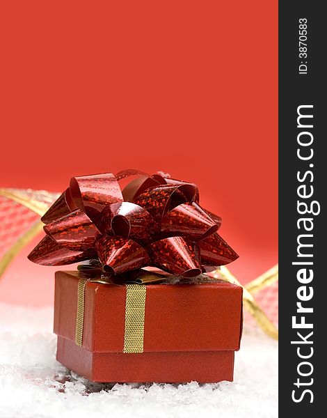 Gift box on red background