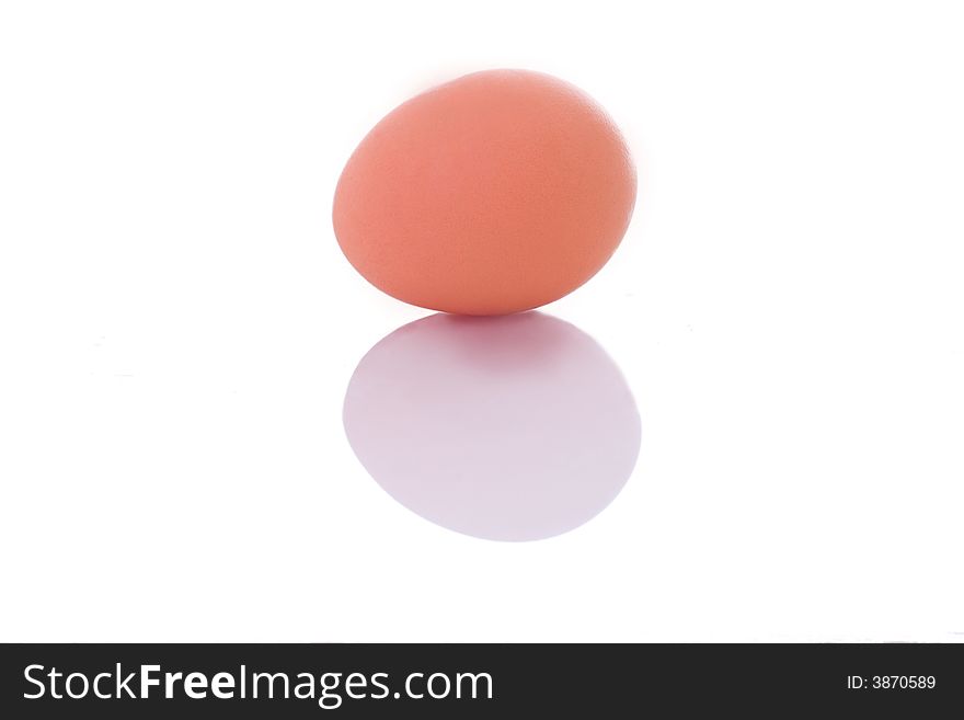 Brown egg isolated on white background