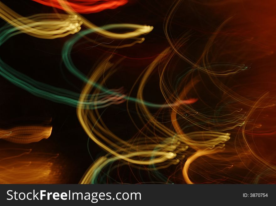 Abstract colorful background with visible rays and beams of light. Abstract colorful background with visible rays and beams of light