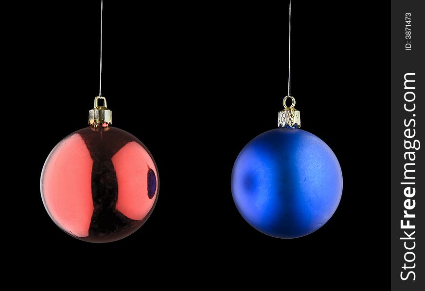 Red and Blue Christmas Baubles against Black Background. Red and Blue Christmas Baubles against Black Background