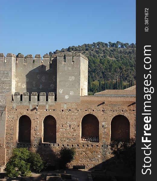 A view of the canon yard and the fortress of the world famous Alhambra palace, Granada, Andalusia, Spain. A view of the canon yard and the fortress of the world famous Alhambra palace, Granada, Andalusia, Spain