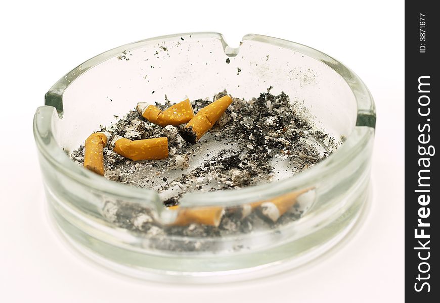 Ash-tray with cigarettes on white background. Ash-tray with cigarettes on white background
