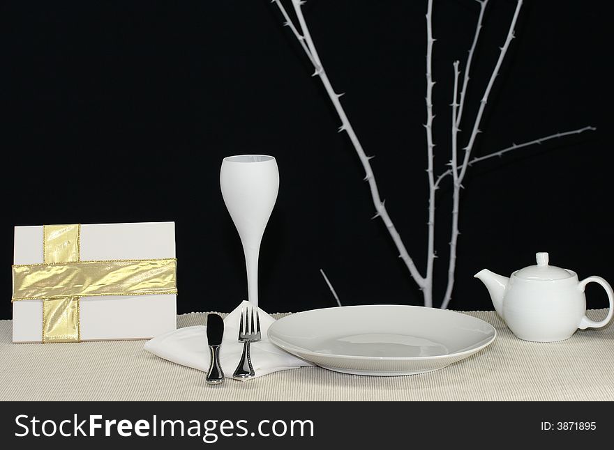 A modern table setting in stark colors
