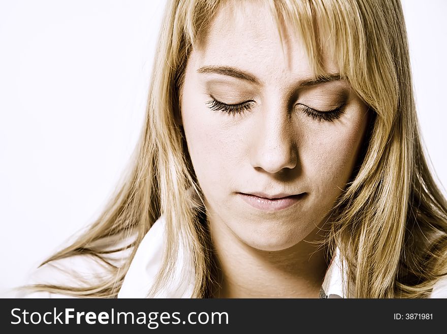 Studio Portrait Of A Long Blond Girl Looking Relax