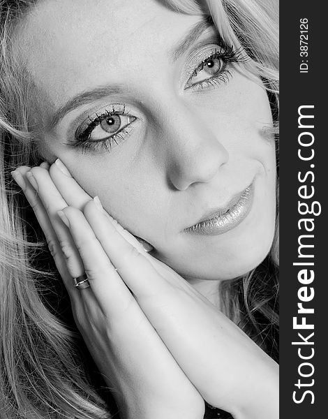 Studio Portrait Of A Long Blond Girl In Rest