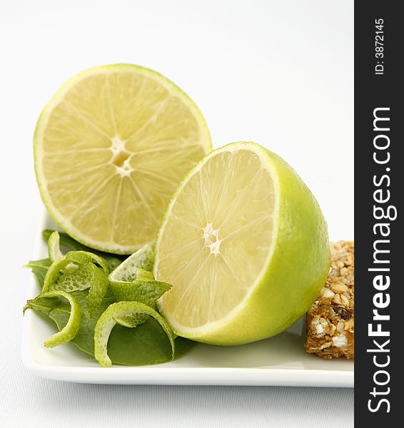 Fresh lime and delicious granola bar. Fresh lime and delicious granola bar