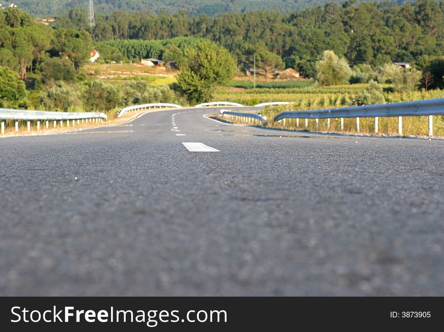 Long straight countryside asphalt road. Long straight countryside asphalt road