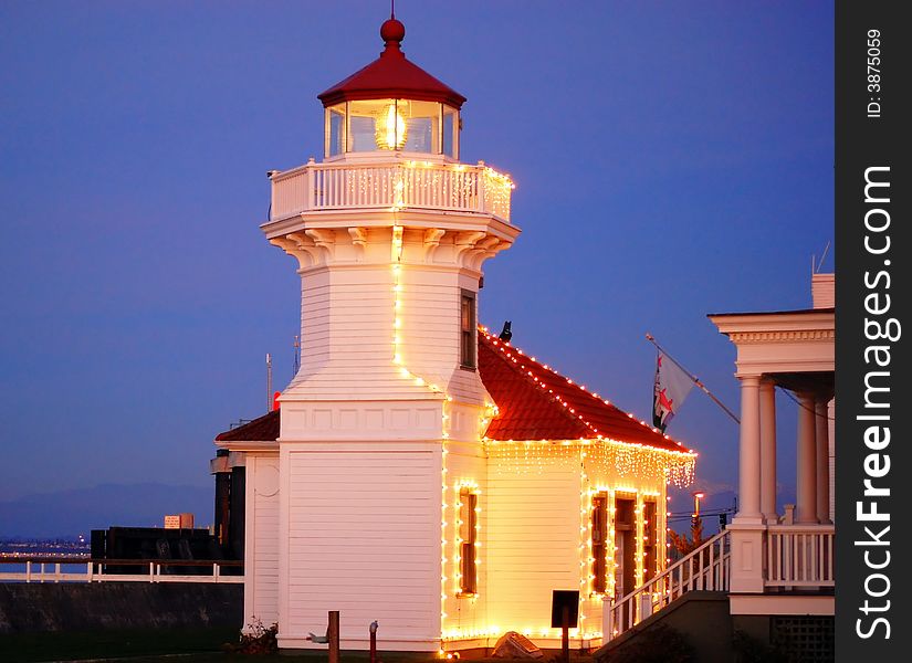 Lighthouse in the pacific northwest lighten up for christmas