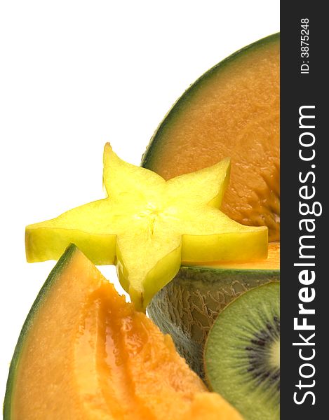 Starfruit and melon and kiwi on white background