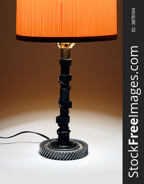 Lamp made out of automotive camshaft and gear. Lamp made out of automotive camshaft and gear