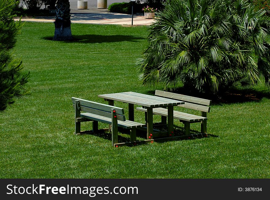 Garden decoration, two seats and a table