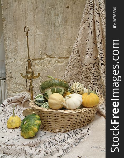 Decorative pumpkins in a basket