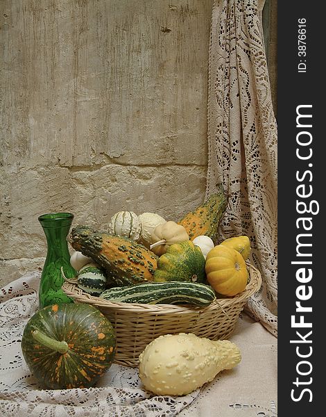 Decorative pumpkins in a basket