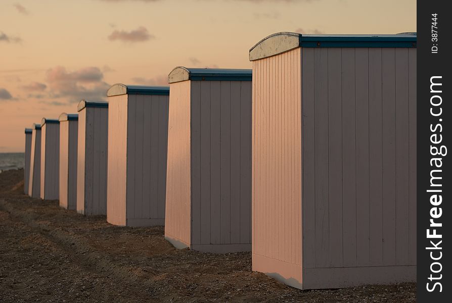 A line of cabins at the beach. A line of cabins at the beach