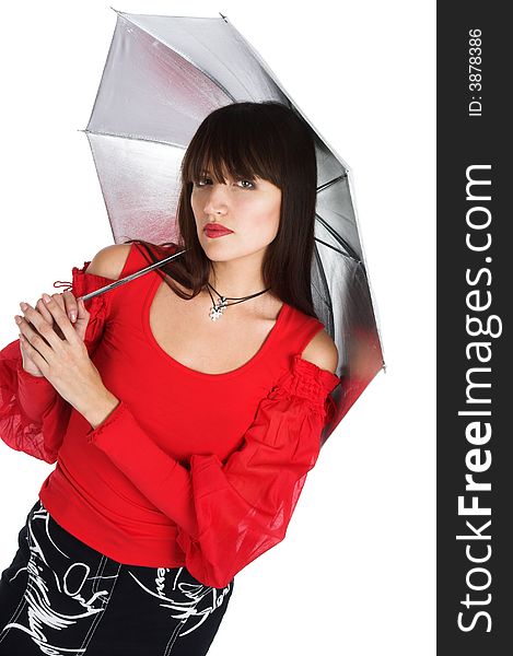 The beautiful girl poses with a umbrella