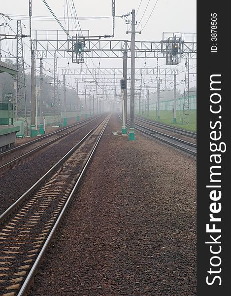 Railroad tracks in mist