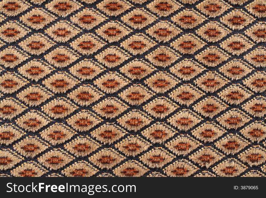 Brown fabric material texture with rhombs. Brown fabric material texture with rhombs