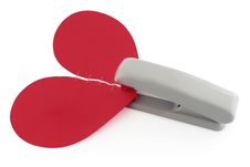 Two Halves Of Red Heart And Stapler Royalty Free Stock Photos