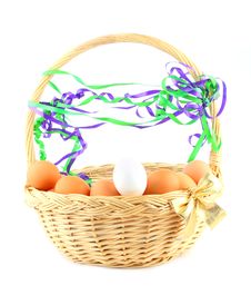 Easter Basket With A Bow, Eggs And Garland Stock Photo Easter Basket With A Bow, Eggs And Garland Stock Photo