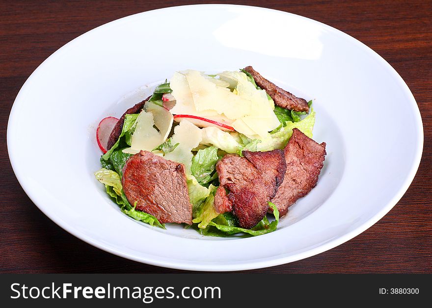 Beef salad with potato and walnut sauce
