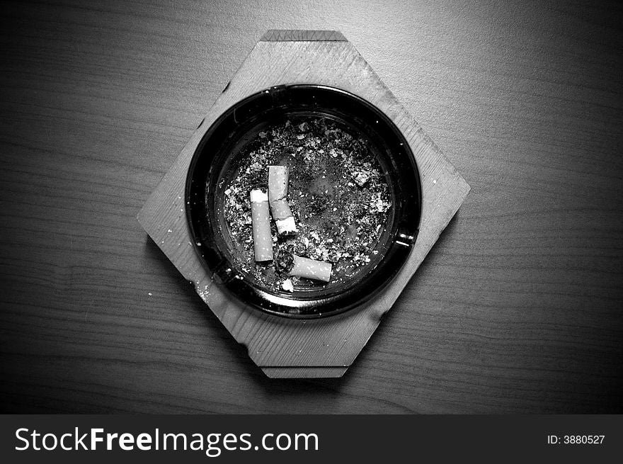 An used ash tray in B/W