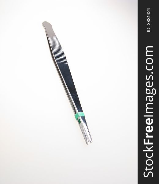 One technical tweezers isolated on  white background