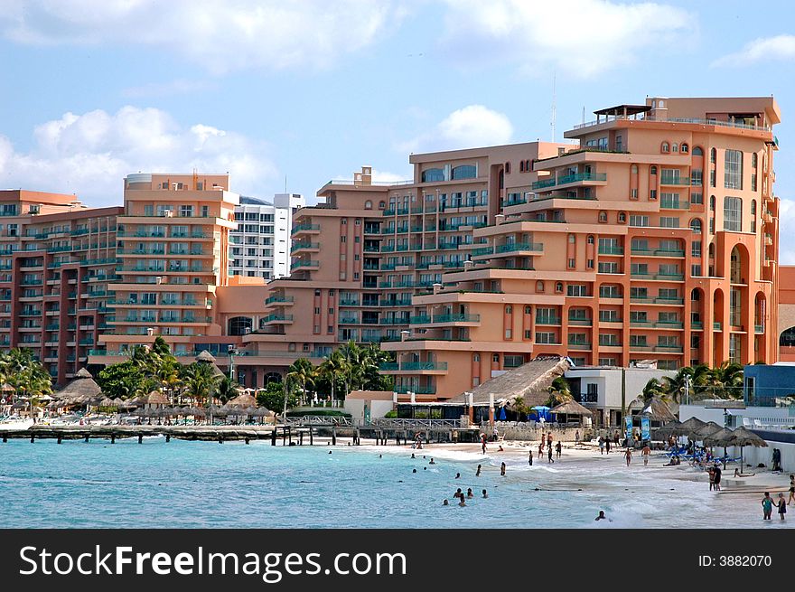 A view of ocean ,beach and beautiful building in cancun. A view of ocean ,beach and beautiful building in cancun