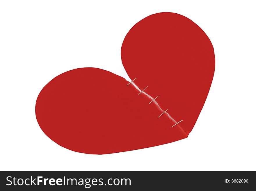 Two halves of red heart isolated on white background