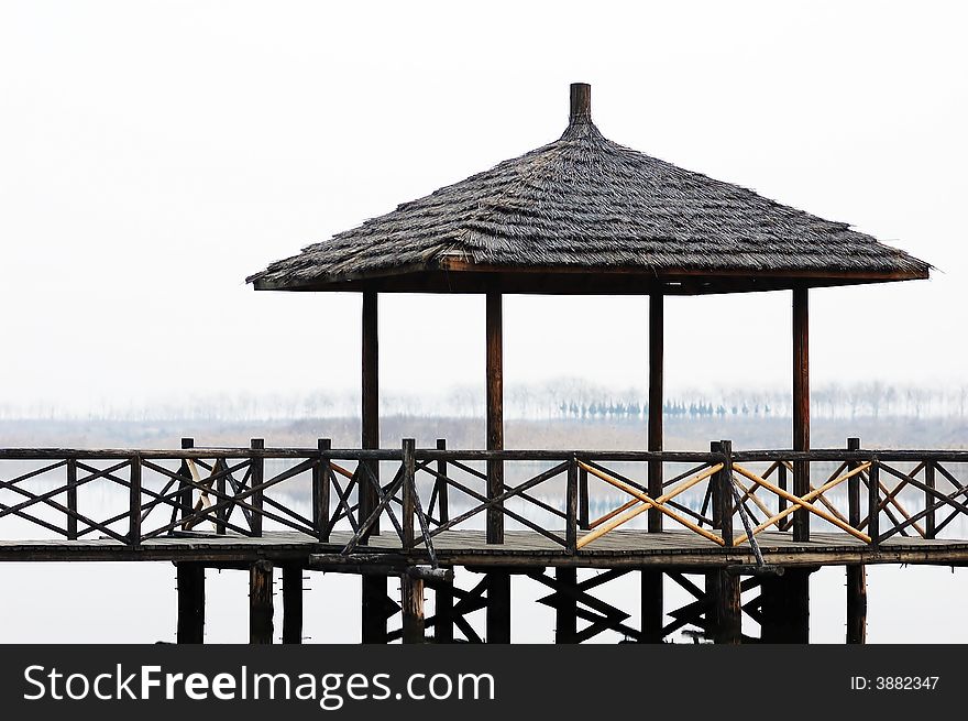 A Chinese style pavilion in a wetland park