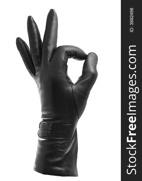 Black glove - ok gesture - isolated on white. Black glove - ok gesture - isolated on white