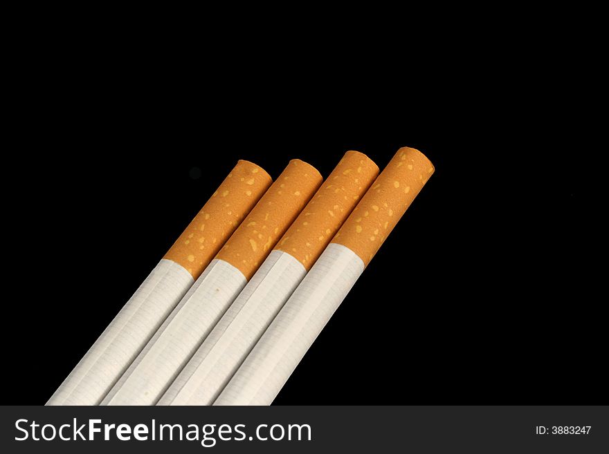 Isolated Cigarettes On A Black Background