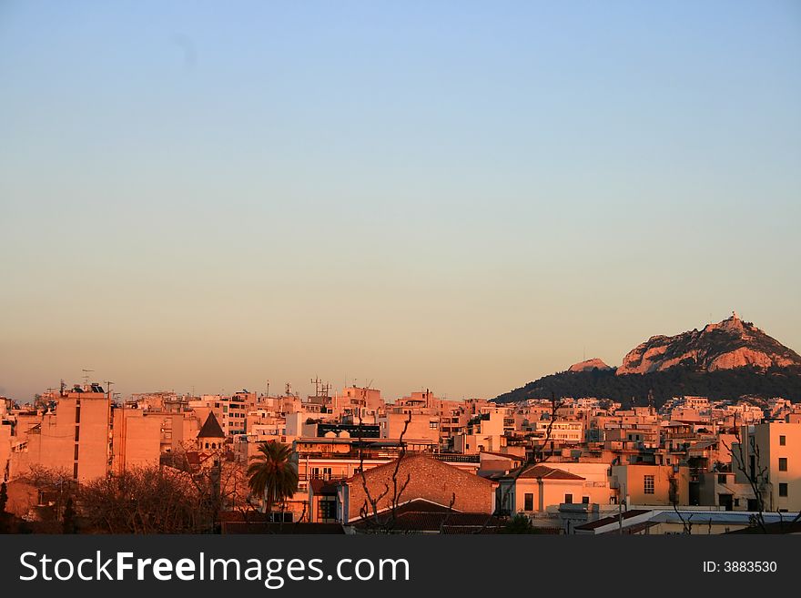 A generla view of a neighborhood in Athens at sunset. A generla view of a neighborhood in Athens at sunset