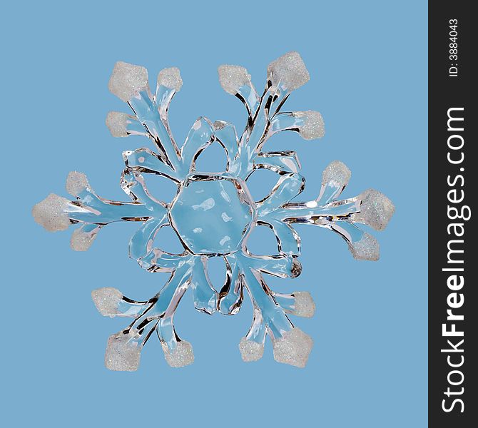 Ice snowflake, isolated on blue background