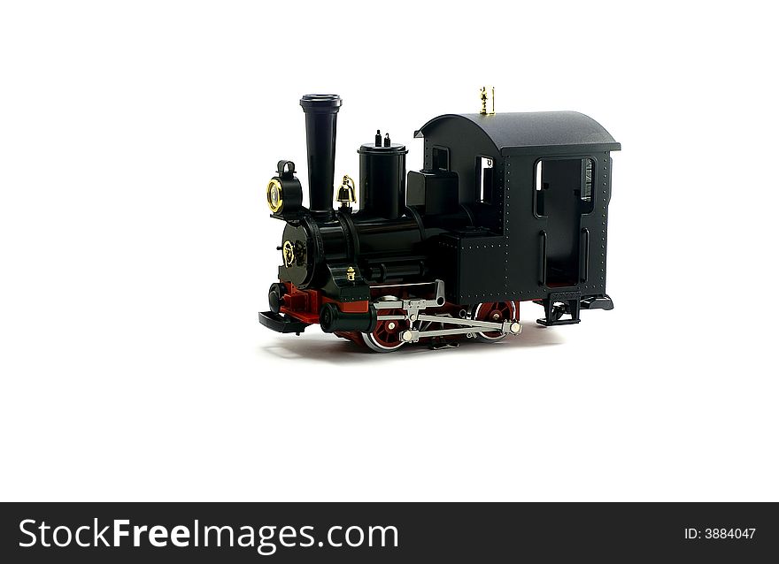 Retro locomotive model on the white background