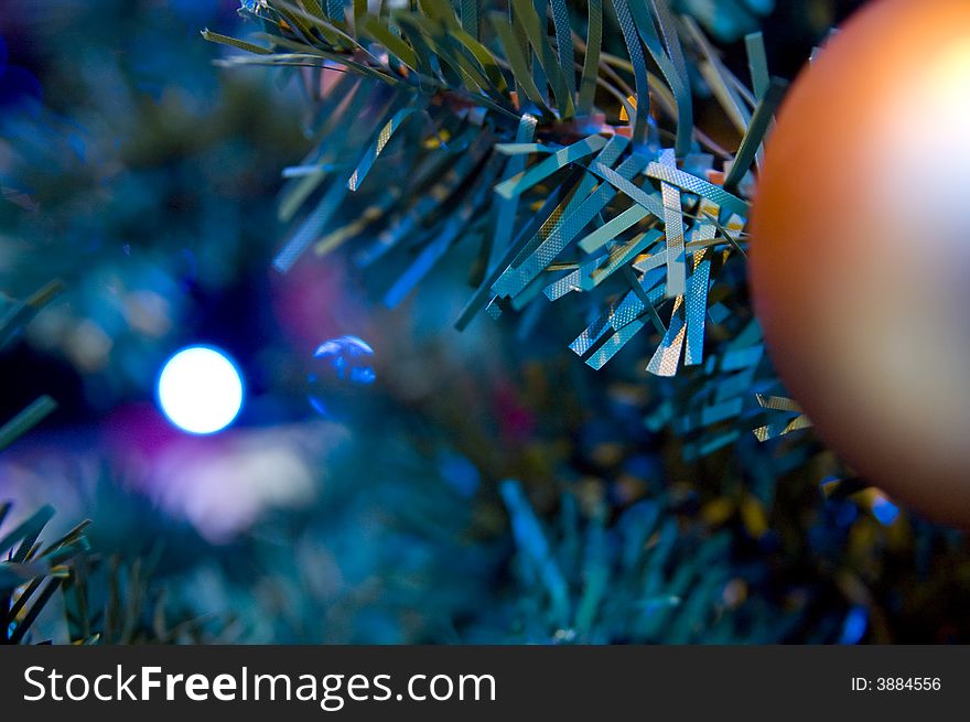 Close-up of Christmas Tree with red and gold ornaments and lights